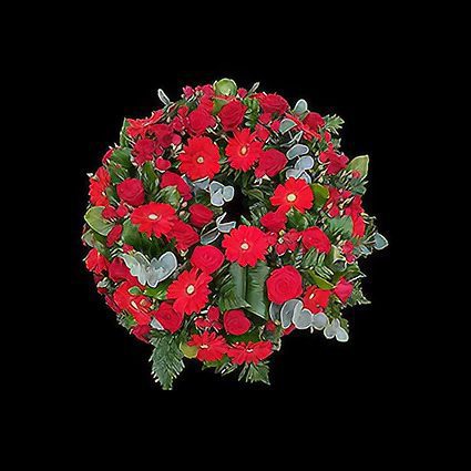 Aranjament funerar realizat de Funerare24 Bucuresti din trandafiri, gerbera, minirose si verdeata decorativa.